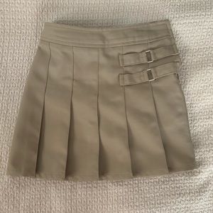 Two khaki French toast two tab scooters